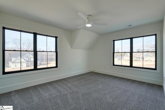 bonus room with lofted ceiling, ceiling fan, and carpet flooring