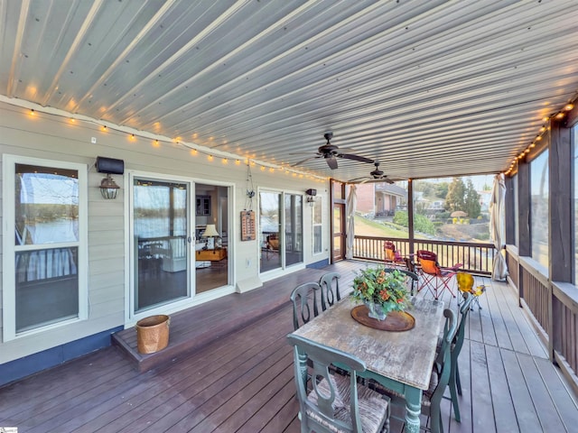 wooden deck with ceiling fan