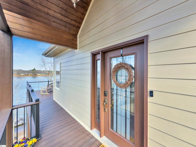 doorway to property featuring a water view