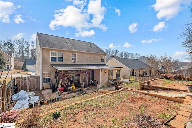 rear view of property with a patio area