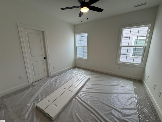 spare room featuring ceiling fan