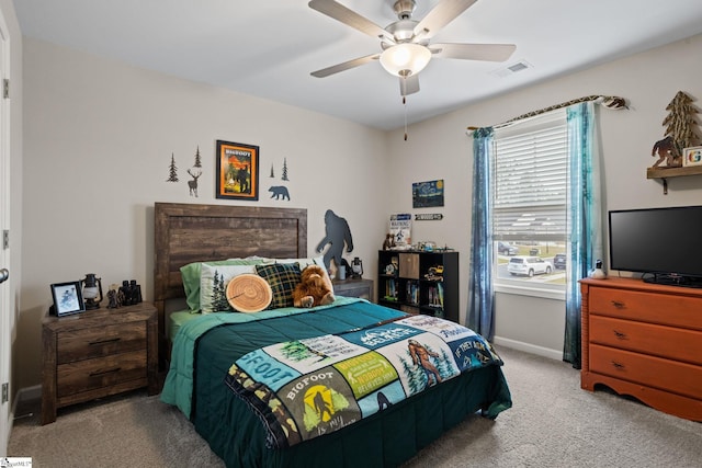 carpeted bedroom featuring ceiling fan