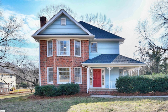 view of front of home with a front lawn