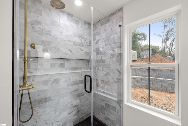 bathroom featuring an enclosed shower