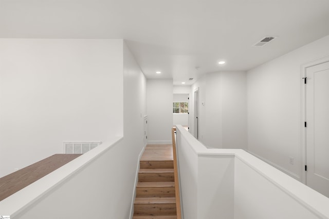 hallway featuring hardwood / wood-style flooring