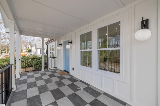 view of patio featuring a porch