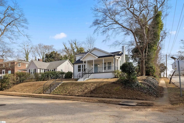 view of front of house with covered porch