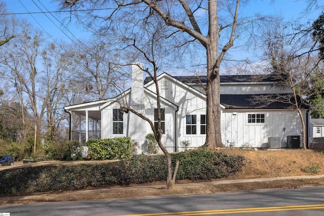 view of home's exterior with central AC