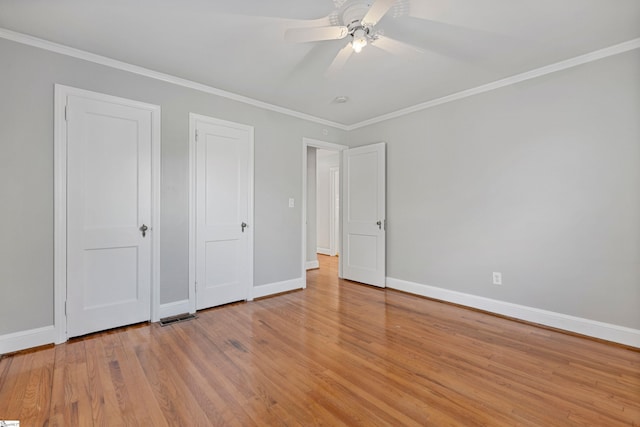 unfurnished bedroom featuring crown molding, ceiling fan, and light hardwood / wood-style floors