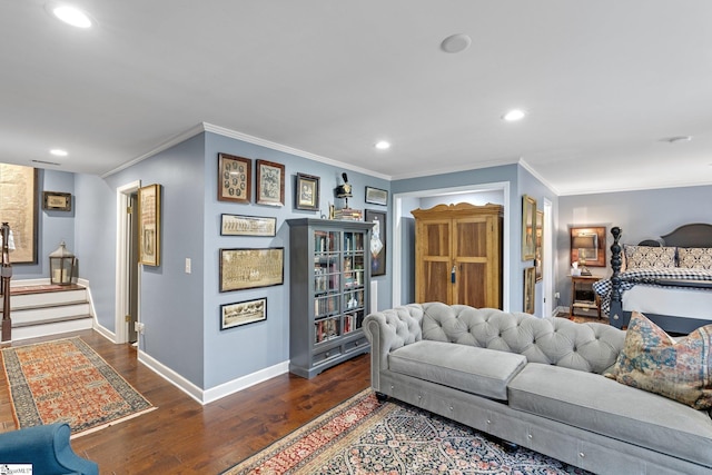 interior space featuring ornamental molding and dark hardwood / wood-style floors