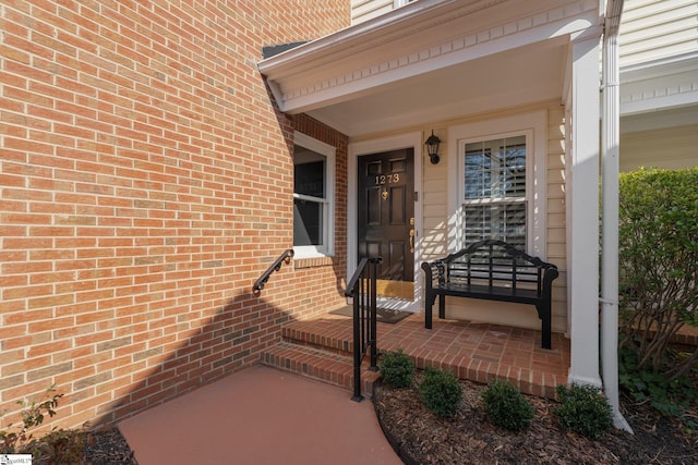 entrance to property with a porch