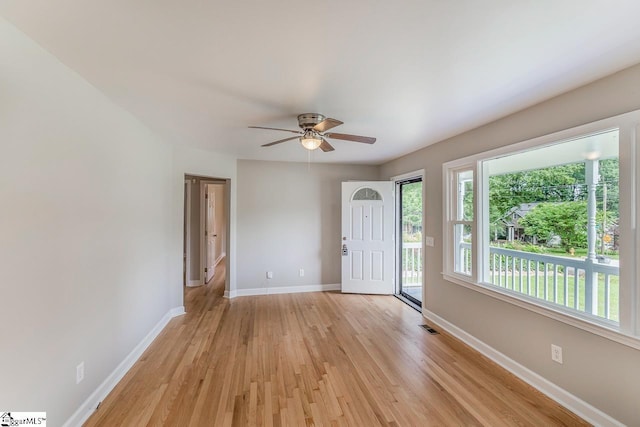 interior space featuring light hardwood / wood-style flooring and ceiling fan