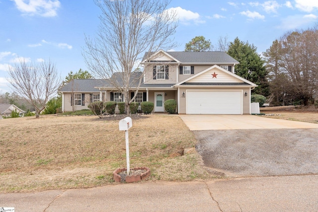 front of property with a garage and a front lawn