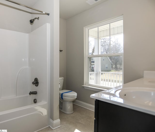 full bathroom featuring vanity, tile patterned floors, washtub / shower combination, and toilet