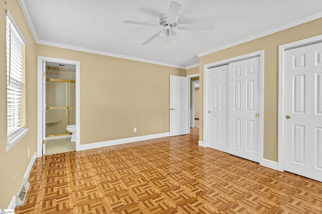 unfurnished bedroom featuring light parquet flooring, ornamental molding, ensuite bathroom, and ceiling fan