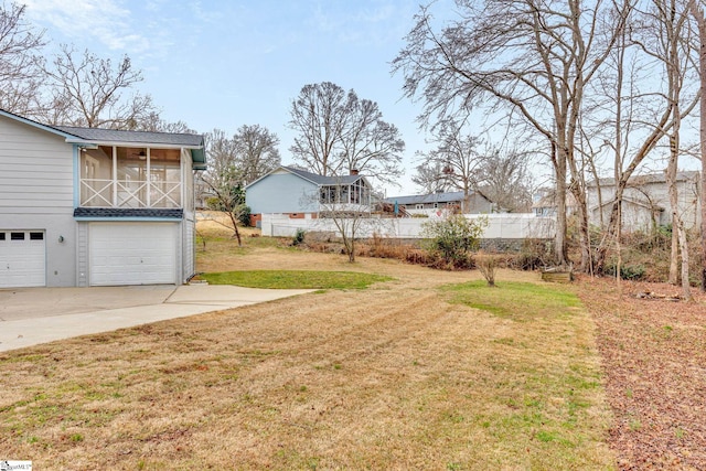 view of yard with a garage