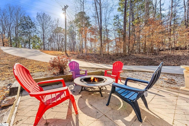 view of patio / terrace featuring a fire pit