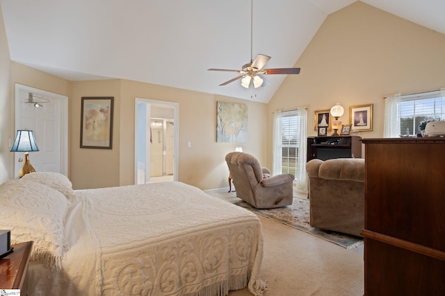 bedroom with high vaulted ceiling, ceiling fan, and carpet flooring