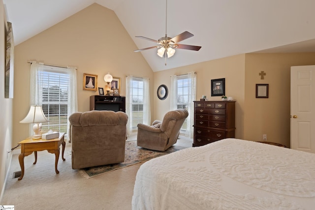 carpeted bedroom featuring ceiling fan, high vaulted ceiling, and multiple windows