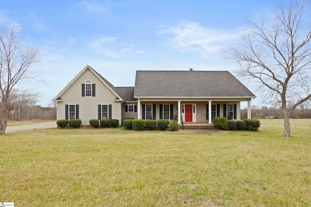 view of front of house with covered porch and a front yard