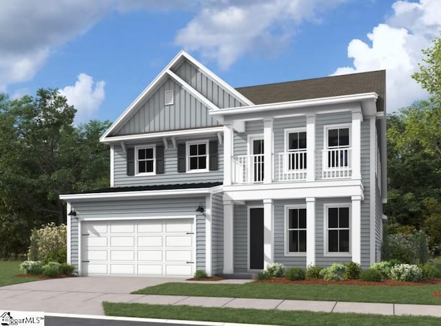 view of front of house featuring a garage and a balcony