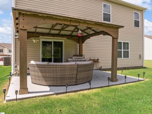 back of property featuring a yard, outdoor lounge area, a patio area, and cooling unit