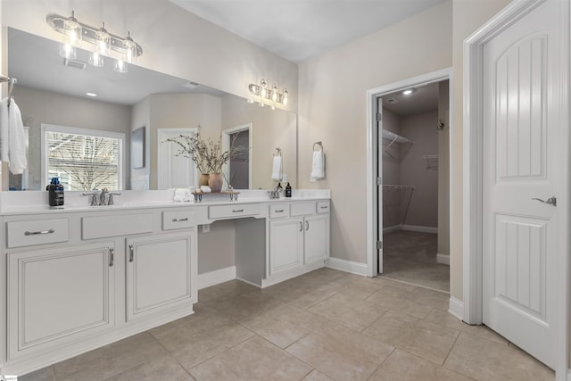 bathroom featuring vanity and tile patterned flooring