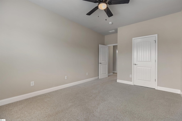 unfurnished bedroom with light carpet and ceiling fan