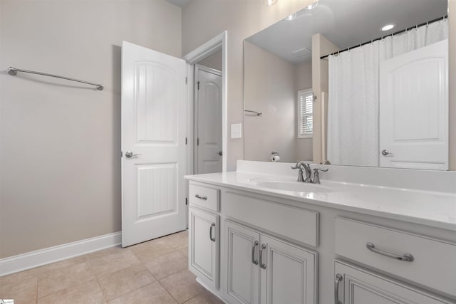 bathroom featuring vanity and tile patterned flooring