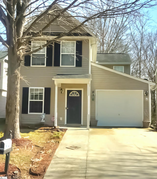 view of front of home with a garage