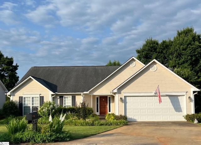 ranch-style home featuring a garage