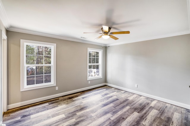 unfurnished room with ornamental molding, ceiling fan, and light hardwood / wood-style flooring