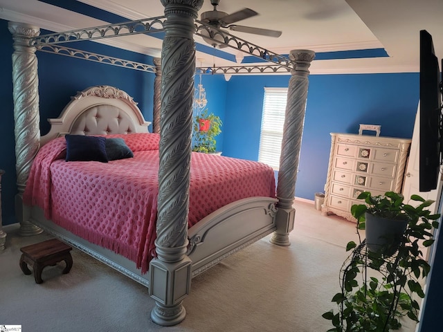 bedroom featuring crown molding, carpet, and ceiling fan