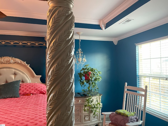 bedroom featuring ornamental molding and a raised ceiling