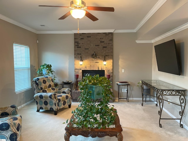 carpeted living room with ceiling fan, ornamental molding, and a brick fireplace