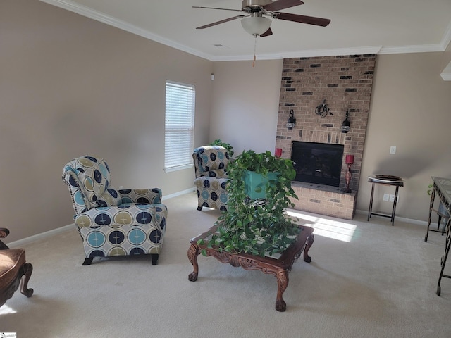 carpeted living room with crown molding, ceiling fan, and a brick fireplace