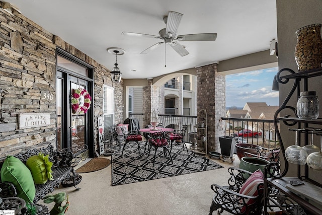 view of patio featuring ceiling fan