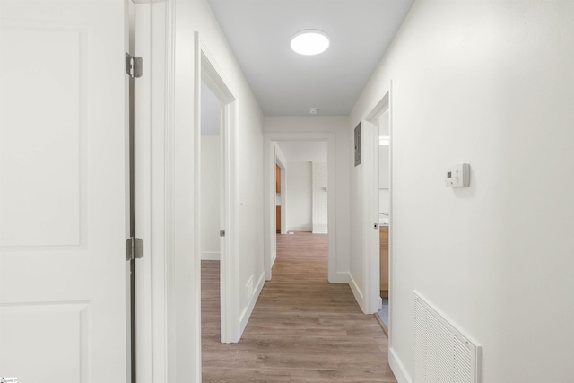 hall featuring light hardwood / wood-style flooring