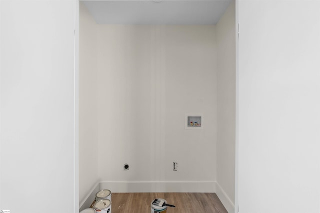 washroom with washer hookup, hardwood / wood-style floors, and electric dryer hookup