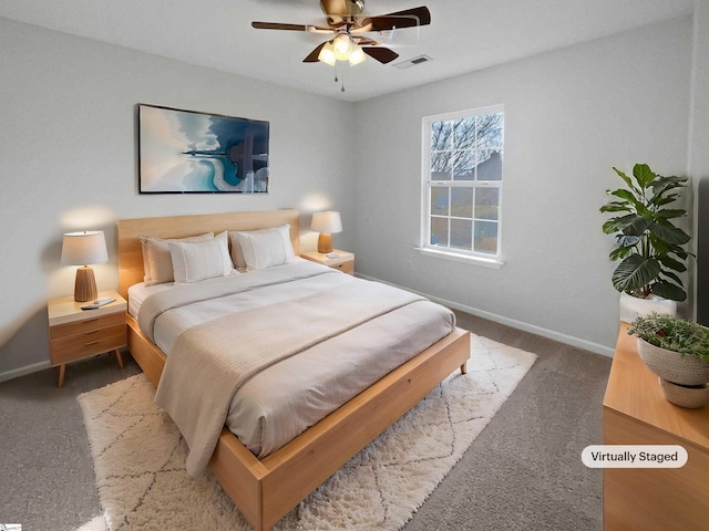 carpeted bedroom featuring ceiling fan