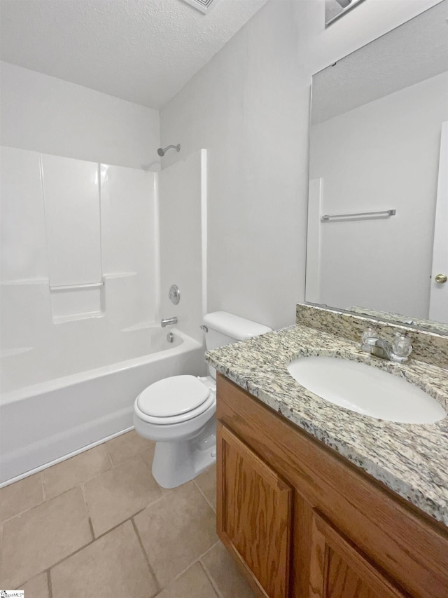 full bathroom with toilet, shower / bathing tub combination, a textured ceiling, vanity, and tile patterned flooring