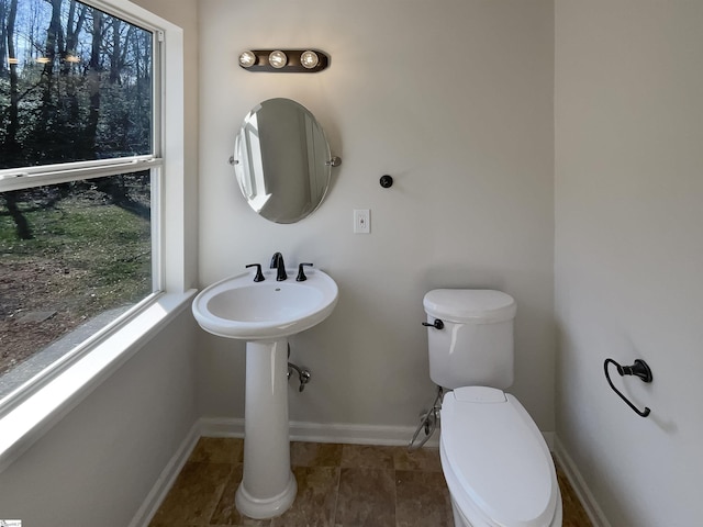 bathroom featuring toilet