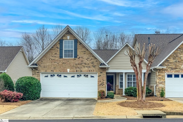 view of front of home with a garage