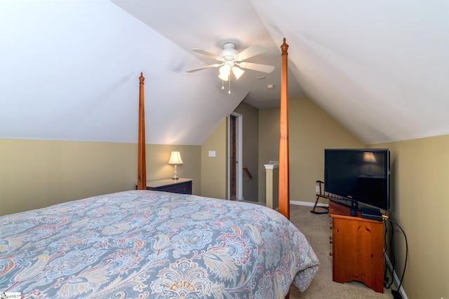 bedroom featuring ceiling fan, light colored carpet, and lofted ceiling