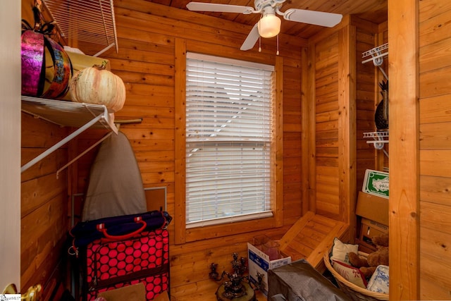 interior space featuring ceiling fan