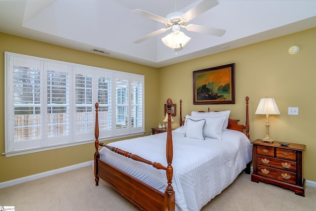 bedroom with light carpet and ceiling fan