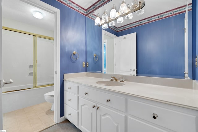 full bathroom with shower / bath combination with glass door, vanity, and toilet
