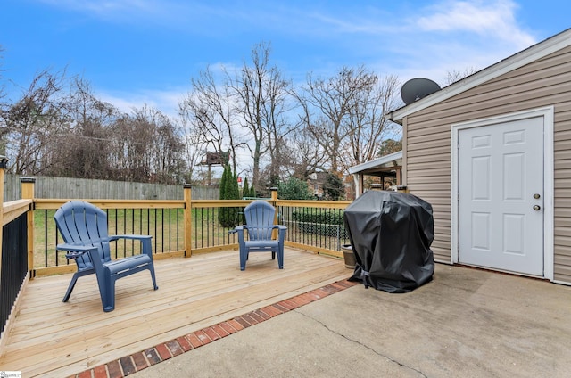 wooden deck featuring grilling area