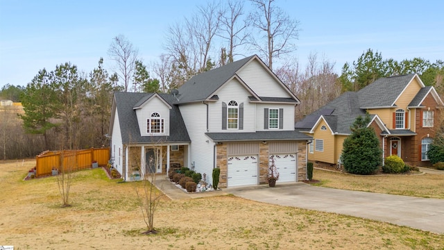 view of front facade featuring a garage and a front yard