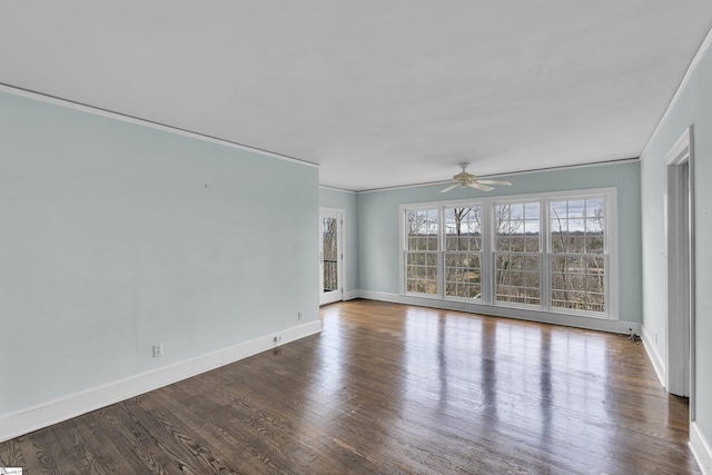 spare room with ceiling fan, ornamental molding, and hardwood / wood-style floors